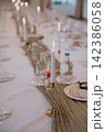 Gourmet dining experience with exquisite dish presentation. Fine wedding dining and culinary art. 142386058