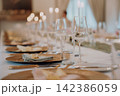 Gourmet dining experience with exquisite dish presentation. Fine wedding dining and culinary art. 142386059