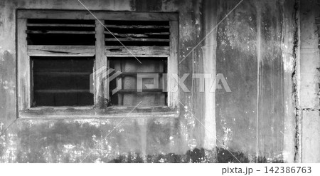 Old Weathered Wooden Window on Stained Concrete Wall Old Weathered Wooden Window on Stained Concrete Wall 142386763