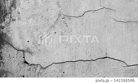 Rough weathered concrete wall with deep cracks Rough weathered concrete wall with deep cracks 142388506