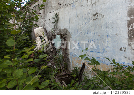 Ruins of a former sphene titanite processing facility near Kirovsk in the Khibiny Mountains, Murmansk Region, Russia. The historic industrial site is associated with a Soviet prison labor camp and the Ruins of a former sphene titanite processing facility near Kirovsk in the Khibiny Mountains, Murmansk Region, Russia. The historic industrial site is associated with a Soviet prison labor camp and the 142389583