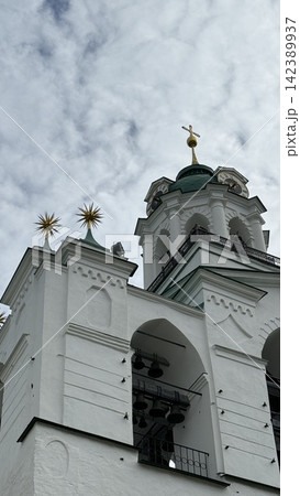 Orthodox church architecture with golden crosses against cloudy sky background Orthodox church architecture with golden crosses against cloudy sky background 142389937
