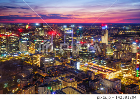 Vivid Warsaw skyline skyscrapers at blue hour twilight in Poland Vivid Warsaw skyline skyscrapers at blue hour twilight in Poland 142391204