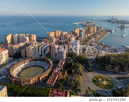 Aerial cityscape of Malaga with La Malagueta bullring and port Aerial cityscape of Malaga with La Malagueta bullring and port 142391290