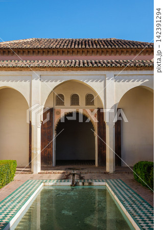 Moorish courtyard with water pool at the Alcazaba of Malaga Moorish courtyard with water pool at the Alcazaba of Malaga 142391294
