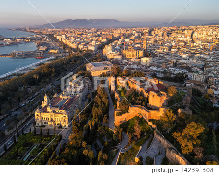 Aerial view of Alcazaba and Malaga city center at golden hour Aerial view of Alcazaba and Malaga city center at golden hour 142391308