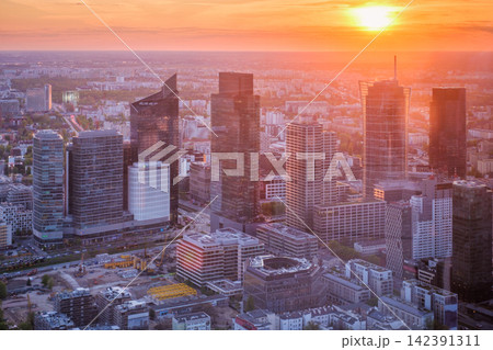 Elevated Warsaw skyline at sunset with dramatic sky over Poland skyscrapers 142391311
