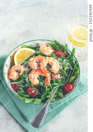 Shrimp salad with arugula and cherry tomatoes, with parmesan cheese, healthy food, 142392499