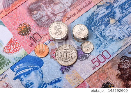 Brunei paper money, dollar banknotes and sen coins as currency for exchange or travel. Brunei money 142392609