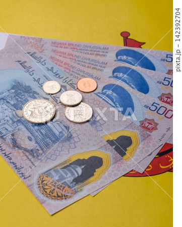 Brunei paper money, dollar banknotes and sen coins as currency for exchange or travel. Brunei money 142392704