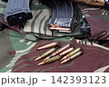 7.62mm Rifle Ammunition and Magazines on Military Camouflage Gear 142393123
