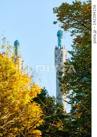 View of Saint Petersburg Blue Mosque through yellow leaves at sunny autumn day, large blue dome, The mosque opened in 1913, was the largest mosque in Europe outside Turkey View of Saint Petersburg Blue Mosque through yellow leaves at sunny autumn day, large blue dome, The mosque opened in 1913, was the largest mosque in Europe outside Turkey 142394156