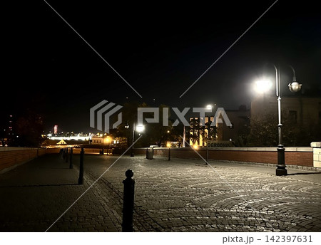 Night view of Przemysl city street and bridge in Poland Night view of Przemysl city street and bridge in Poland 142397631