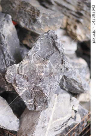 Rocks piled together in a construction site area 142398942