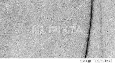 Vertical cracks in the texture of a weathered concrete wall. Vertical cracks in the texture of a weathered concrete wall. 142401651