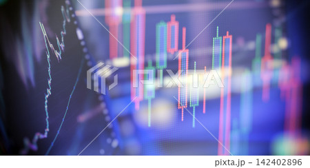 Abstract digital background showing stock market volatility and cryptocurrency investment graphs with blurred bokeh. 142402896