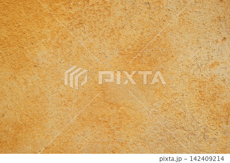 Warm Yellow Plaster Wall Texture With Rustic Weathered Surface Background Warm Yellow Plaster Wall Texture With Rustic Weathered Surface Background 142409214
