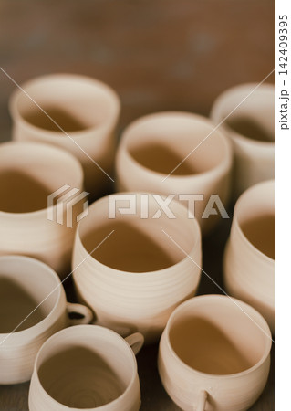 The process of creating pottery. The process of creating pottery. 142409395