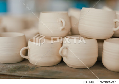 The process of creating pottery. The process of creating pottery. 142409397