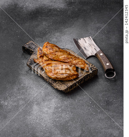 Grilled chicken steak seasoned with salt and spices. Chicken steak 142412345