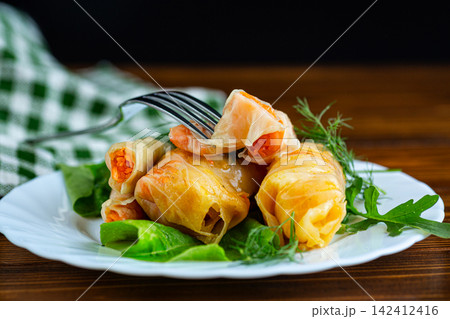 Authentic Korean vegetable cabbage rolls with carrot filling Authentic Korean vegetable cabbage rolls with carrot filling 142412416