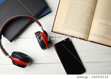 Flat lay composition with books on white wooden table Flat lay composition with books on white wooden table 142415114