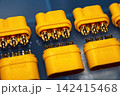 Vibrant yellow MR60 power connectors, both male and female, with gleaming gold-plated solder terminals for 3-phase motor wiring, shot up close on a blue surface 142415468