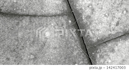 Monochromatic textured concrete surface with various cracks 142417003