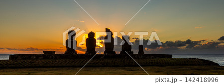 Tahai Archaeological Complex with Moai Statues on Stone Platforms at Sunset on Easter Island, Valparaiso, Chile. Banner Web, Copy Space Tahai Archaeological Complex with Moai Statues on Stone Platforms at Sunset on Easter Island, Valparaiso, Chile. Banner Web, Copy Space 142418996
