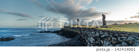 Tahai Archaeological Complex with Moai Statues on Stone Platforms at Sunset on Easter Island, Valparaiso, Chile. Banner Web, Copy Space Tahai Archaeological Complex with Moai Statues on Stone Platforms at Sunset on Easter Island, Valparaiso, Chile. Banner Web, Copy Space 142419001