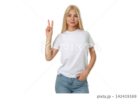 Blonde woman in a white t-shirt and jeans, isolated, PNG 142419169