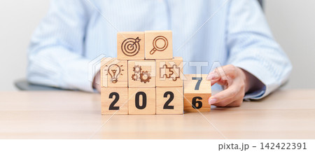 2027 year block with business icon. Goal, Target, Resolution, strategy, plan, Action, mission, motivation, and New Year start concepts 2027 year block with business icon. Goal, Target, Resolution, strategy, plan, Action, mission, motivation, and New Year start concepts 142422391