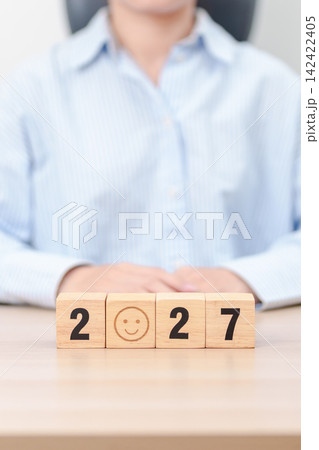 Happy New Year 2027 with Smile block. Satisfaction, feedback, Review, mental health, eco sustainable and good year concept Happy New Year 2027 with Smile block. Satisfaction, feedback, Review, mental health, eco sustainable and good year concept 142422405