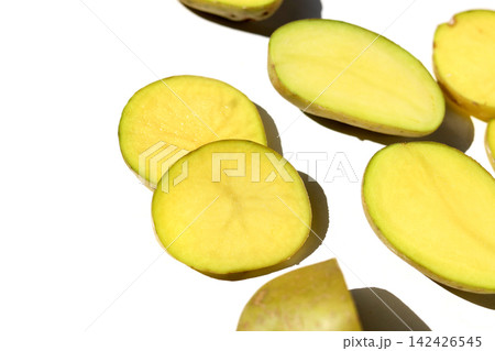 Raw potatoes on a white background. Raw potatoes on a white background. 142426545