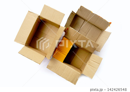 Pile of used open cardboard parcel boxes for recycling Pile of used open cardboard parcel boxes for recycling 142426548