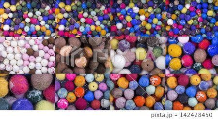 Background of multi-colored balls of wool felted Background of multi-colored balls of wool felted 142428450