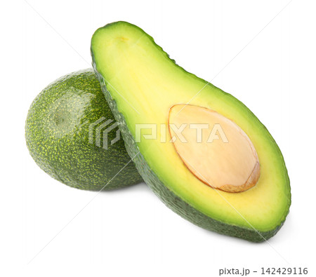 Tasty ripe avocados on white background. Tropical fruit Tasty ripe avocados on white background. Tropical fruit 142429116