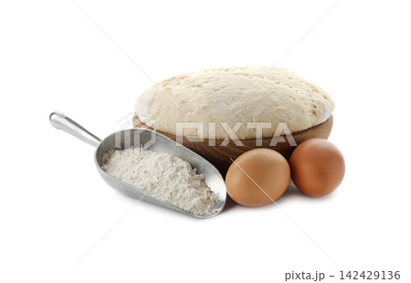 Dough, eggs and flour on white background. Cooking pastries Dough, eggs and flour on white background. Cooking pastries 142429136