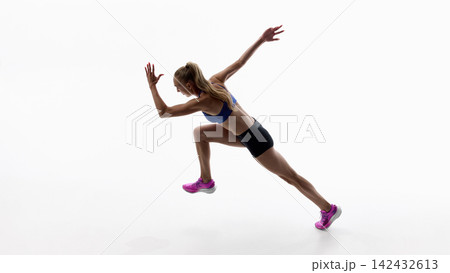 Explosive sprint launch driven by muscular power on white background Explosive sprint launch driven by muscular power on white background 142432613