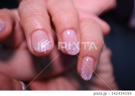 Close-Up of Glitter Nails on Hands 142434193