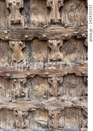 Close Up of Ancient Wooden Door with Metal Rivets on Historic Building in Verona City Center Italy Close Up of Ancient Wooden Door with Metal Rivets on Historic Building in Verona City Center Italy 142435151