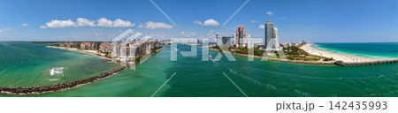Luxury panoramic view on Fisher island. Miami south beach aerial panorama. Panoramic landscape of Miami south beach, Florida. Aerial panorama view. Landscape aerial Miami skyscraper cityscape Luxury panoramic view on Fisher island. Miami south beach aerial panorama. Panoramic landscape of Miami south beach, Florida. Aerial panorama view. Landscape aerial Miami skyscraper cityscape 142435993