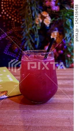 Refreshing berry cocktail in a bar. Vertical Photograph Refreshing berry cocktail in a bar. Vertical Photograph 142436488
