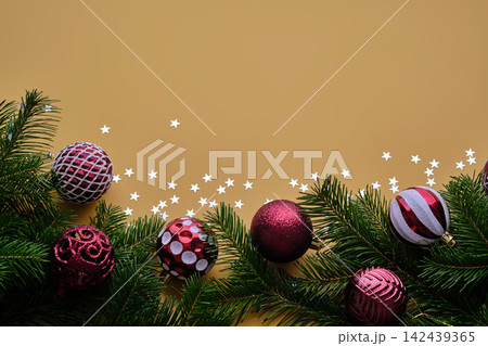 Christmas new year yellow background. Place for the text in Christmas decoration. Christmas new year yellow background. Place for the text in Christmas decoration. 142439365