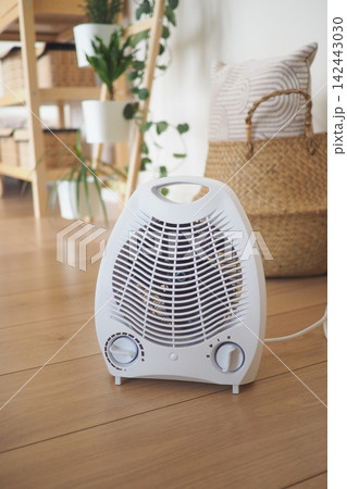 Small heater in a cozy indoor space Small heater in a cozy indoor space 142443030