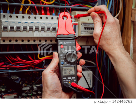 Electrical equipment. Tester in the hands. 142446762