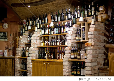 Wine bottles on a rack Wine bottles on a rack 142448078