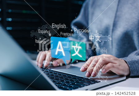 Multilingual language translation technology concept. Person using laptop with icons languages, global language translate, multilingual communication, and international connections. AI translator Multilingual language translation technology concept. Person using laptop with icons languages, global language translate, multilingual communication, and international connections. AI translator 142452528
