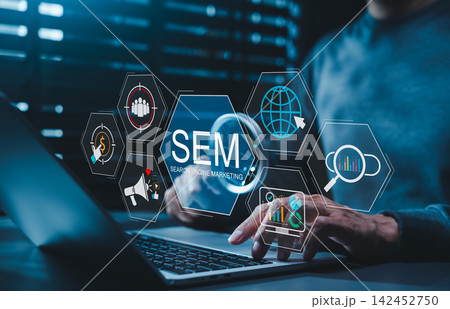 SEM Search Engine Marketing Concept. Professional using laptop with targeting icons, analytics, paid ads, global outreach representing online advertising strategy, performance-driven digital marketing 142452750