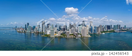 Aerial panorama of Brickell in Miami. Downtown Miami skyline on a sunny day. Scenic view of Miami Beach and Brickell. Miamis Skyscrapers. Brickell famous landmarks. Miami downtown landscape. Aerial panorama of Brickell in Miami. Downtown Miami skyline on a sunny day. Scenic view of Miami Beach and Brickell. Miamis Skyscrapers. Brickell famous landmarks. Miami downtown landscape. 142456543